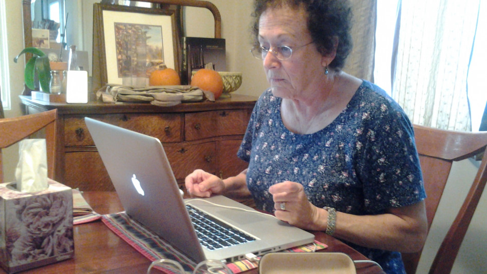Elderly person using laptop KimSanDiego CC by nd2 v2.0