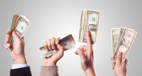 Money in hands 401kcalculator v2.org CC BY SA 2.0
